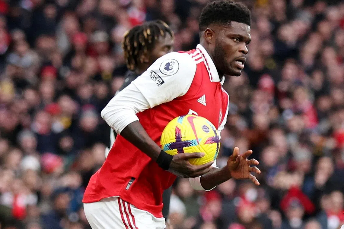 FILE PHOTO: Soccer Football - Premier League - Arsenal v AFC Bournemouth - Emirates Stadium, London, Britain - March 4, 2023 Arsenal's Thomas Partey reacts after scoring their first goal REUTERS/David Klein /File Photo