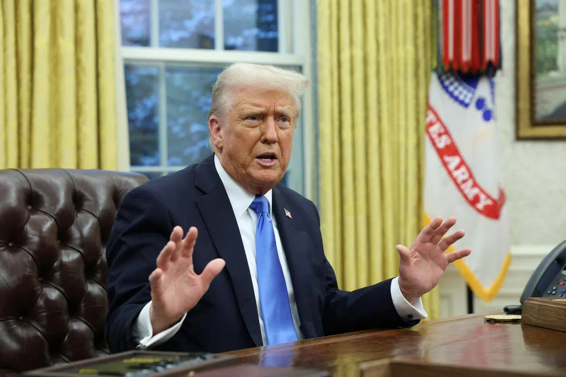 U.S. President Donald Trump speaks in the Oval Office of the White House in Washington, D.C., U.S., February 11, 2025.   REUTERS/Kevin Lamarque