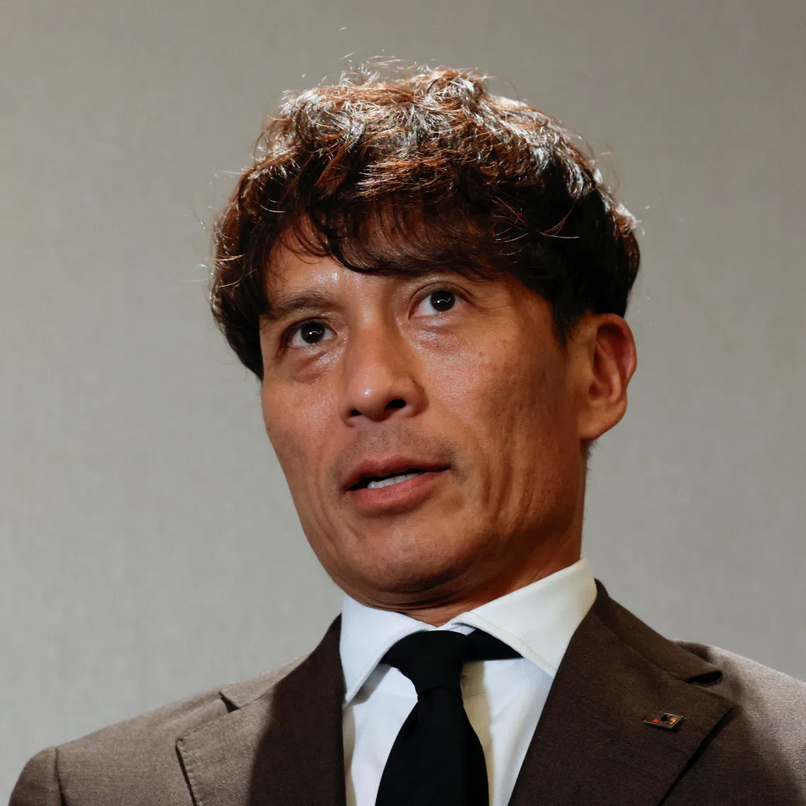 Japan Football Association President Tsuneyasu Miyamoto talks to reporters after the Asian Football Confederation (AFC)'s extraordinary congress in Tokyo, Japan, October 23, 2026. REUTERS/Kim Kyung-Hoon
