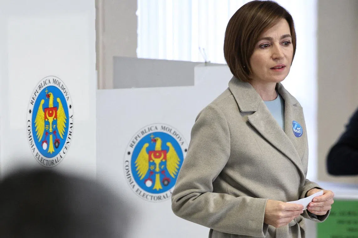 Moldova's incumbent President and presidential candidate Maia Sandu casts her ballot at a polling station during the second round of the presidential election in Chisinau, Moldova November 3, 2024. REUTERS/Vladislav Culiomza