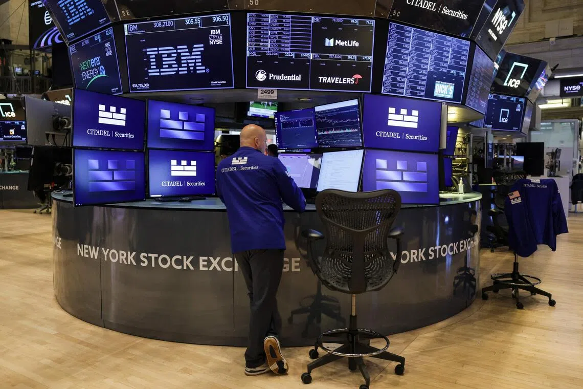 Traders working on the floor of the New York Stock Exchange, in New York City, on Oct 30.