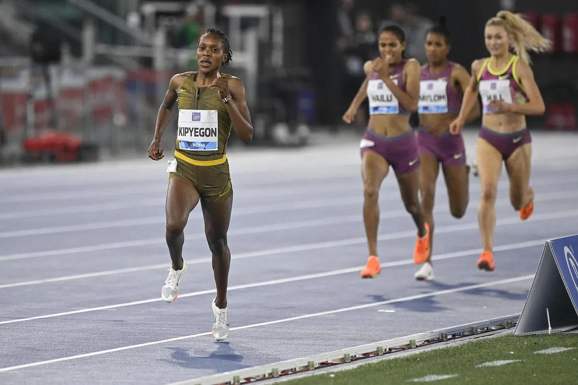 Kenya's Faith Kipyegon celebrating as she crosses the finishing line to win the women's 1,500m title at the Memorial Van Damme Diamond League meet in Brussels on Sept 14, 2024. 