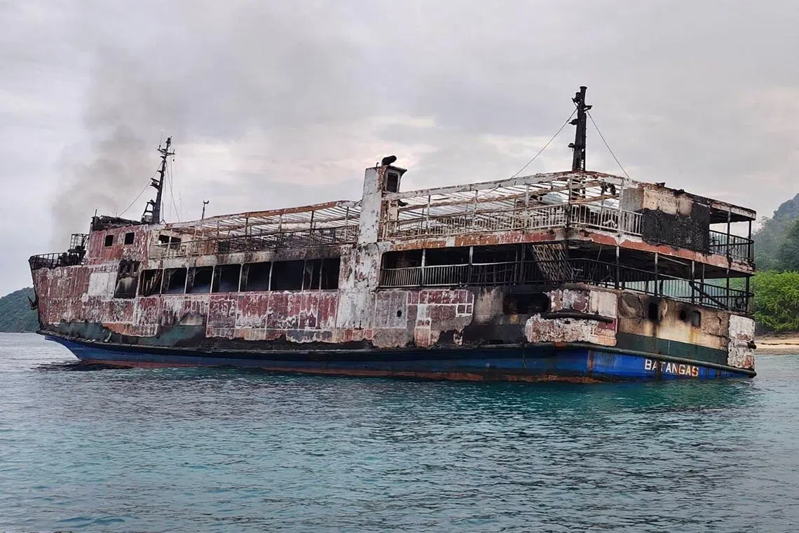 Philippines says it may take months to identify ferry fire victims