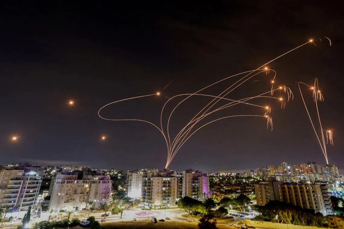 Israel's Iron Dome anti-missile system intercepts rockets launched from the Gaza Strip, as seen from the city of Ashkelon, Israel, October 9, 2023. REUTERS/Amir Cohen