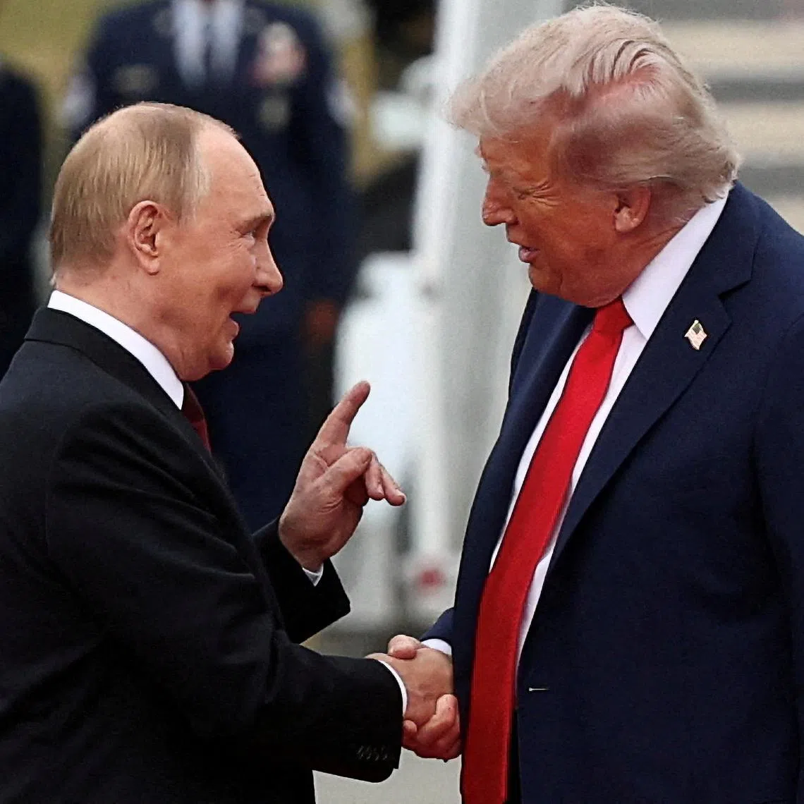 Mr Putin read the “peace letter” immediately after Mr Trump handed it to him.