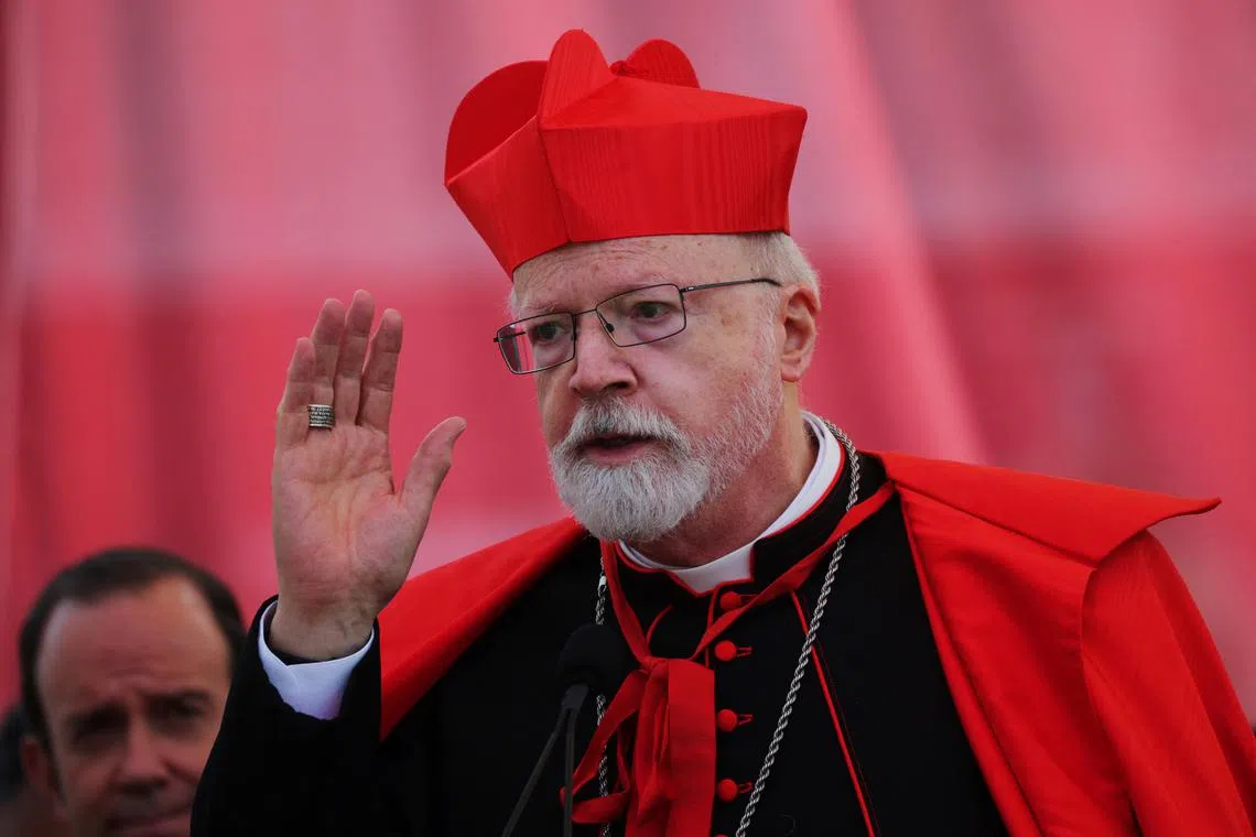 FILE PHOTO: Boston Archbishop Cardinal Sean O'Malley delivers a blessing during Commencement ceremonies at Boston College in Chestnut Hill, Massachusetts, U.S., May 22, 2023.     REUTERS/Brian Snyder/File Photo
