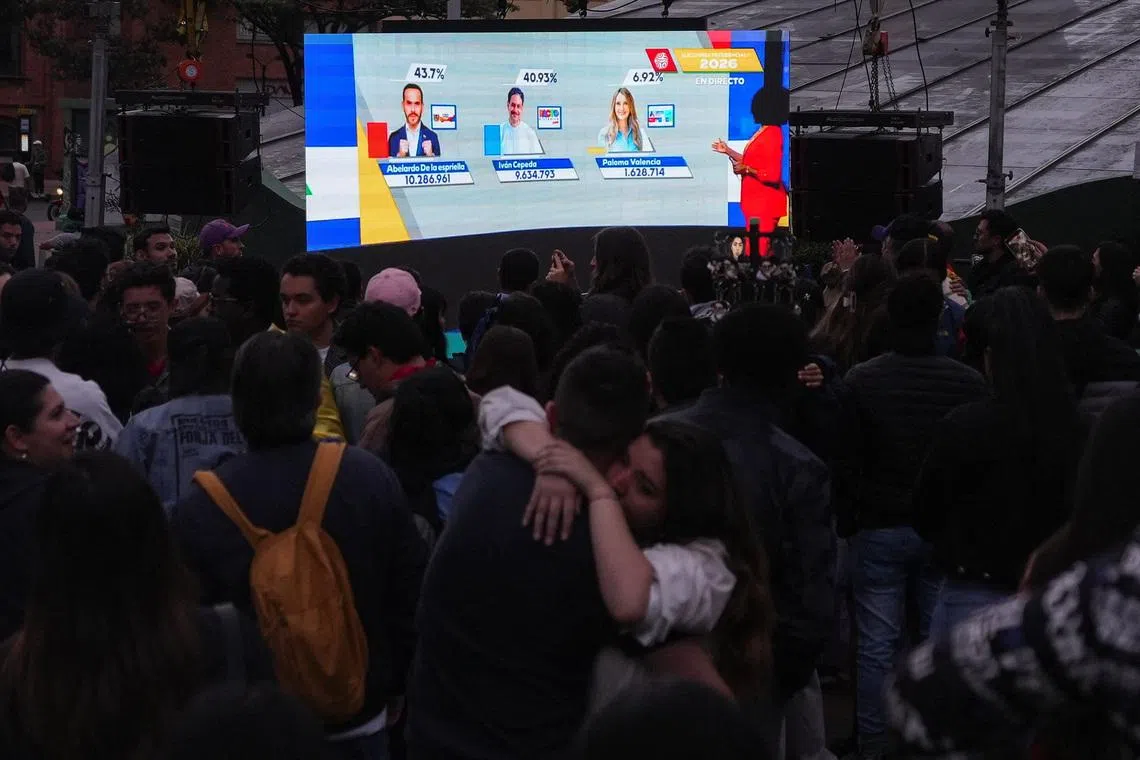People react to the results of the first round of the presidential election, in Bogota, Colombia May 31, 2026. REUTERS/Enea Lebrun