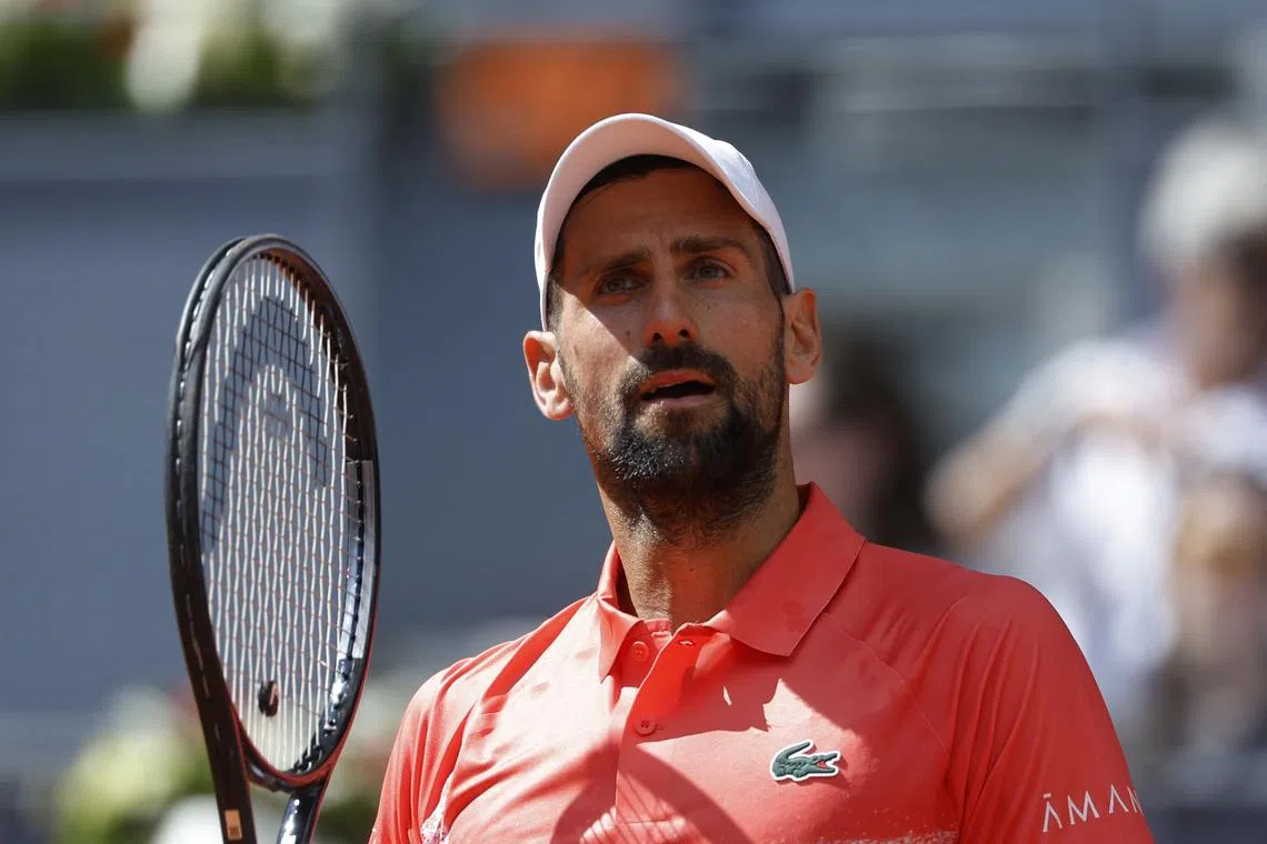 Tennis - Madrid Open - Park Manzanares, Madrid, Spain - April 26, 2025 Serbia's Novak Djokovic reacts during his round of 64 match against Italy's Matteo Arnaldi REUTERS/Juan Medina