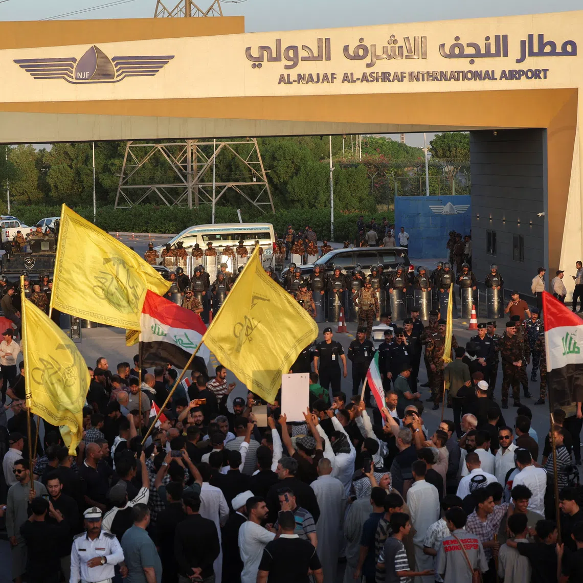 Protesters gather outside Najaf International Airport to protest U.S. restrictions targeting Iranian aviation activities and their impact on flights between Iran and Iraq, in Najaf, Iraq, September 28, 2026. REUTERS/Alaa Al-Marjani