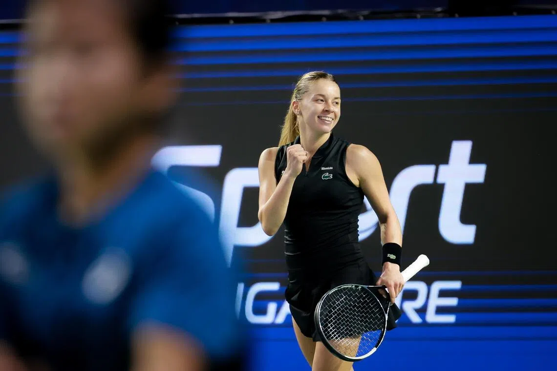 Belgium's Elise Mertens (purple) in action against Poland's Maja Chwalinska (black) during their women's singles quarter-final match at the Singapore Tennis Open on Sept 25, 2026.
