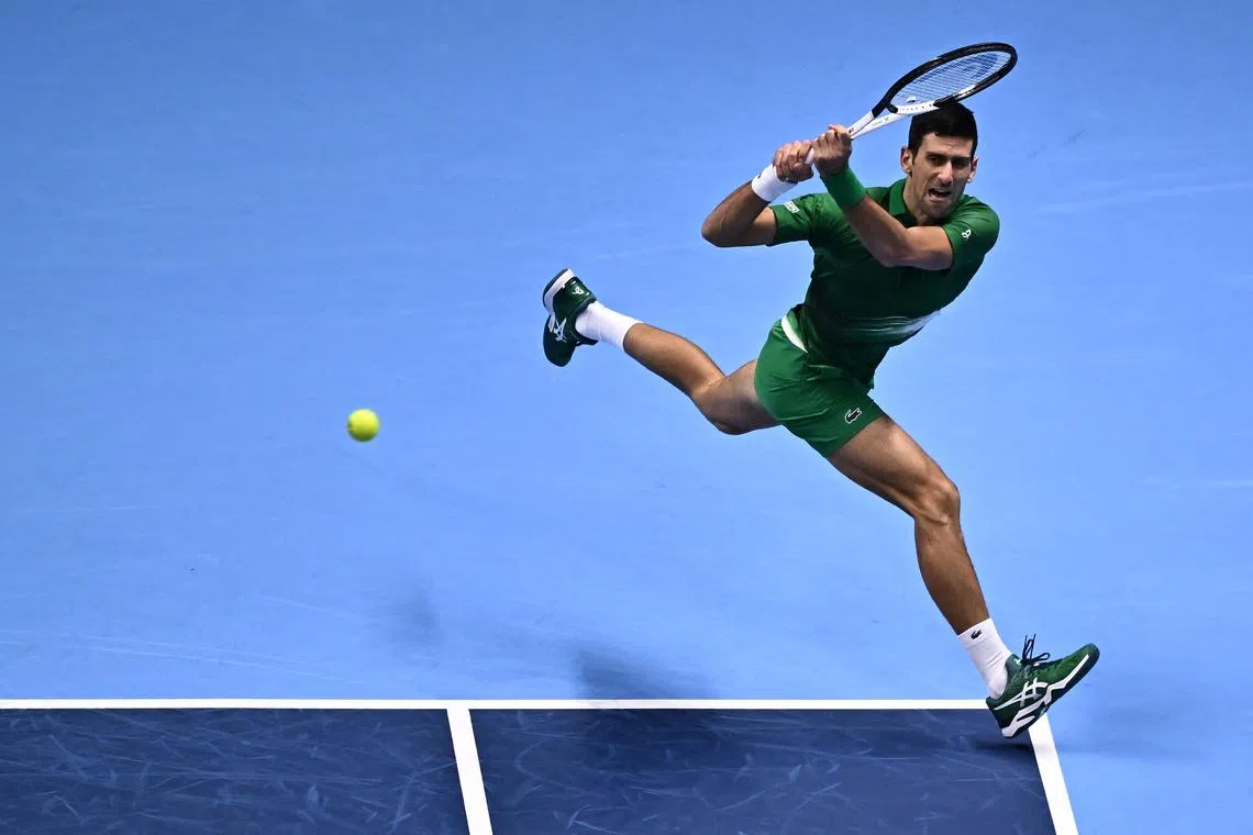 Novak Djokovic returns to Andrey Rublev during their ATP Finals round-robin match on Nov 16, 2022.