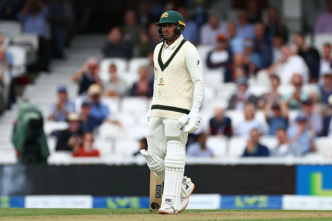 FILE PHOTO: Cricket - Ashes - Fifth Test - England v Australia - The Oval, London, Britain - July 28, 2023  Australia's Usman Khawaja reacts after being given out for lbw off the bowling of England's Stuart Broad Action Images via Reuters/Andrew Boyers/FILE PHOTO