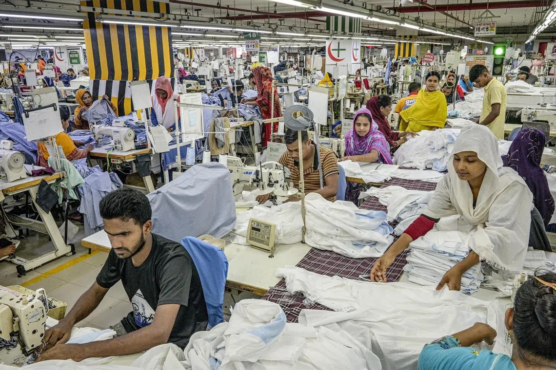 Garment factories and banks reopened in Bangladesh on July 24 after authorities eased a curfew.
