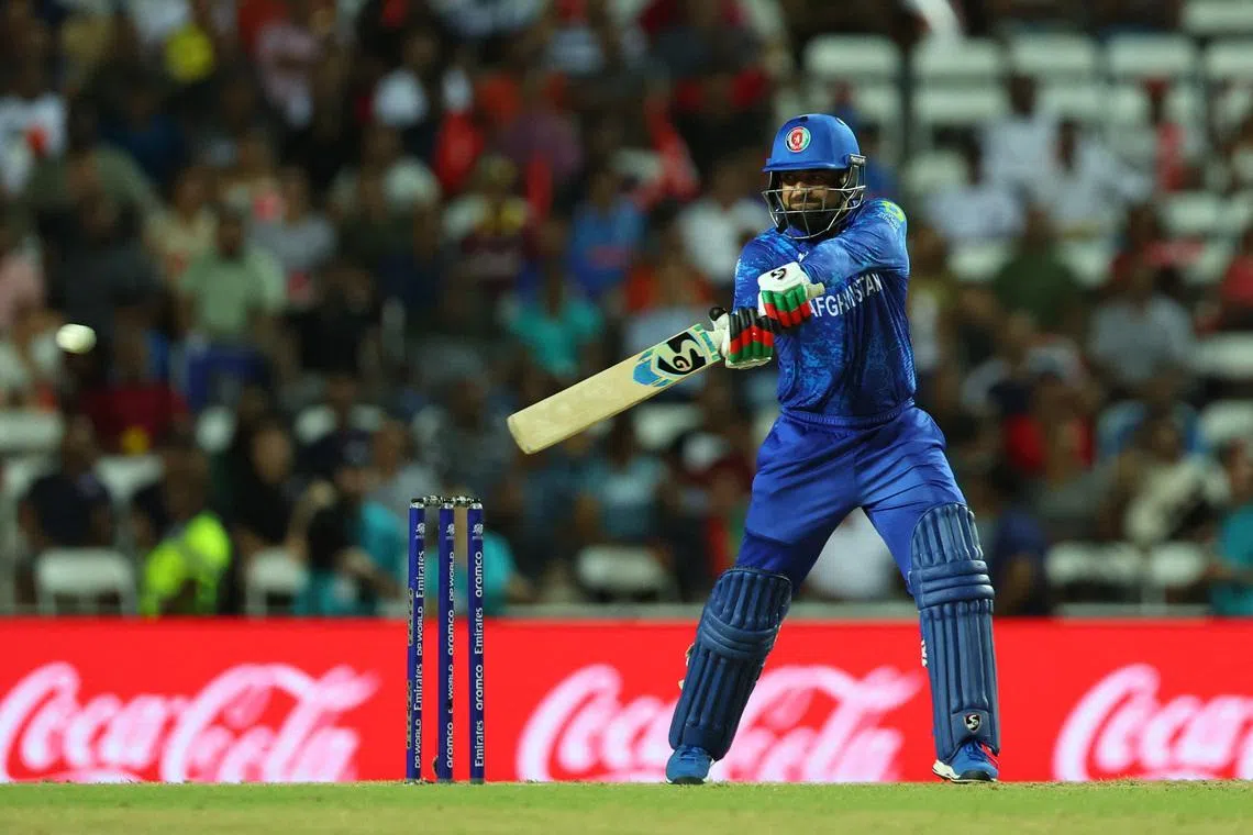 Cricket - T20 World Cup - Semi Final - South Africa v Afghanistan - Brian Lara Stadium, Tarouba, Trinidad and Tobago - June 26, 2024 Afghanistan's Rashid Khan in action REUTERS/Ash Allen