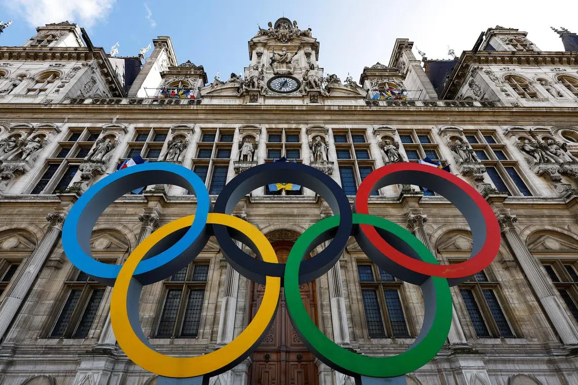 The Olympic rings are seen in front of Paris' City Hall, in preparation for the 2024 Olympic Games.