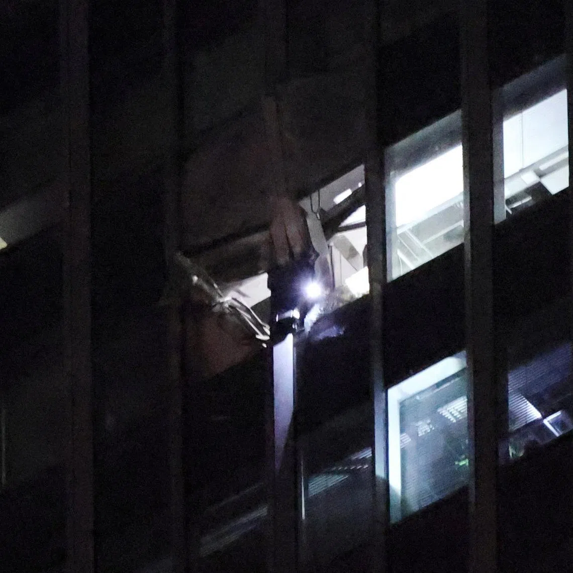 The damaged exterior of CITIC Tower, also known as China Zun, in Beijing, China, on June 26.