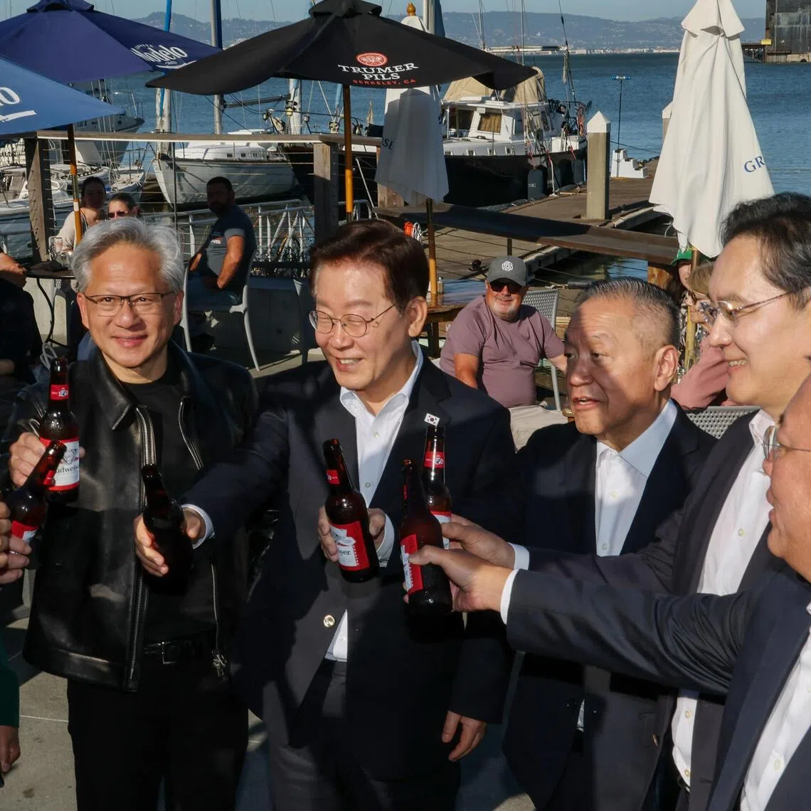 South Korean President Lee Jae Myung (centre) toasts with the leaders of some of the world’s most valuable technology companies in San Francisco, California, US, on July 24.