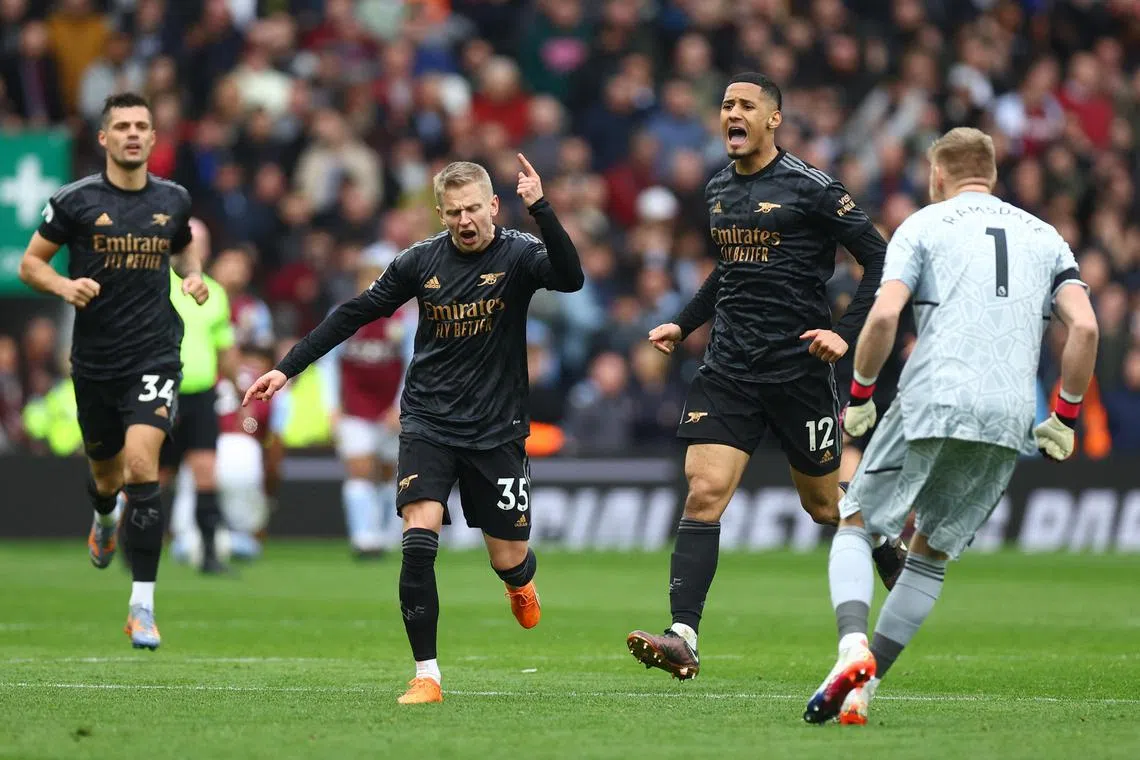 Arsenal players celebrate after scoring their second goal against Aston Villa on Feb 18, 2022.