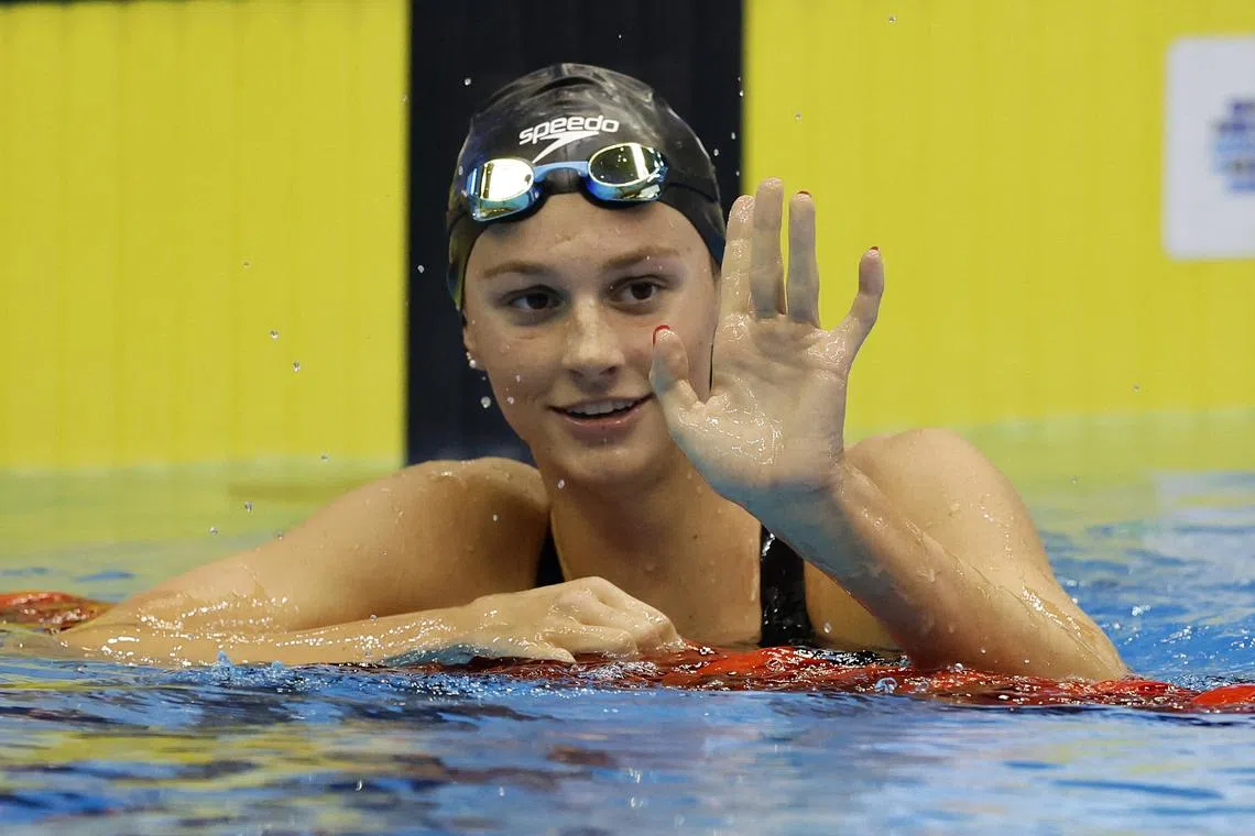 FILE PHOTO: Fukuoka 2023 World Aquatics Championships - Swimming - Marine Messe Fukuoka Hall A, Fukuoka, Japan - July 30, 2023 Canada's Summer McIntosh celebrates after winning the women's 400m individual medley final REUTERS/Stefan Wermuth/File Photo