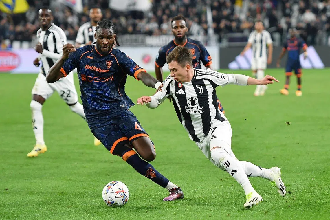 Juventus' Francisco Conceicao taking on Lecce's Kialonda Gaspar in their Italian Serie A match at Allianz Stadium in Turin, Italy on April 12, 2025.