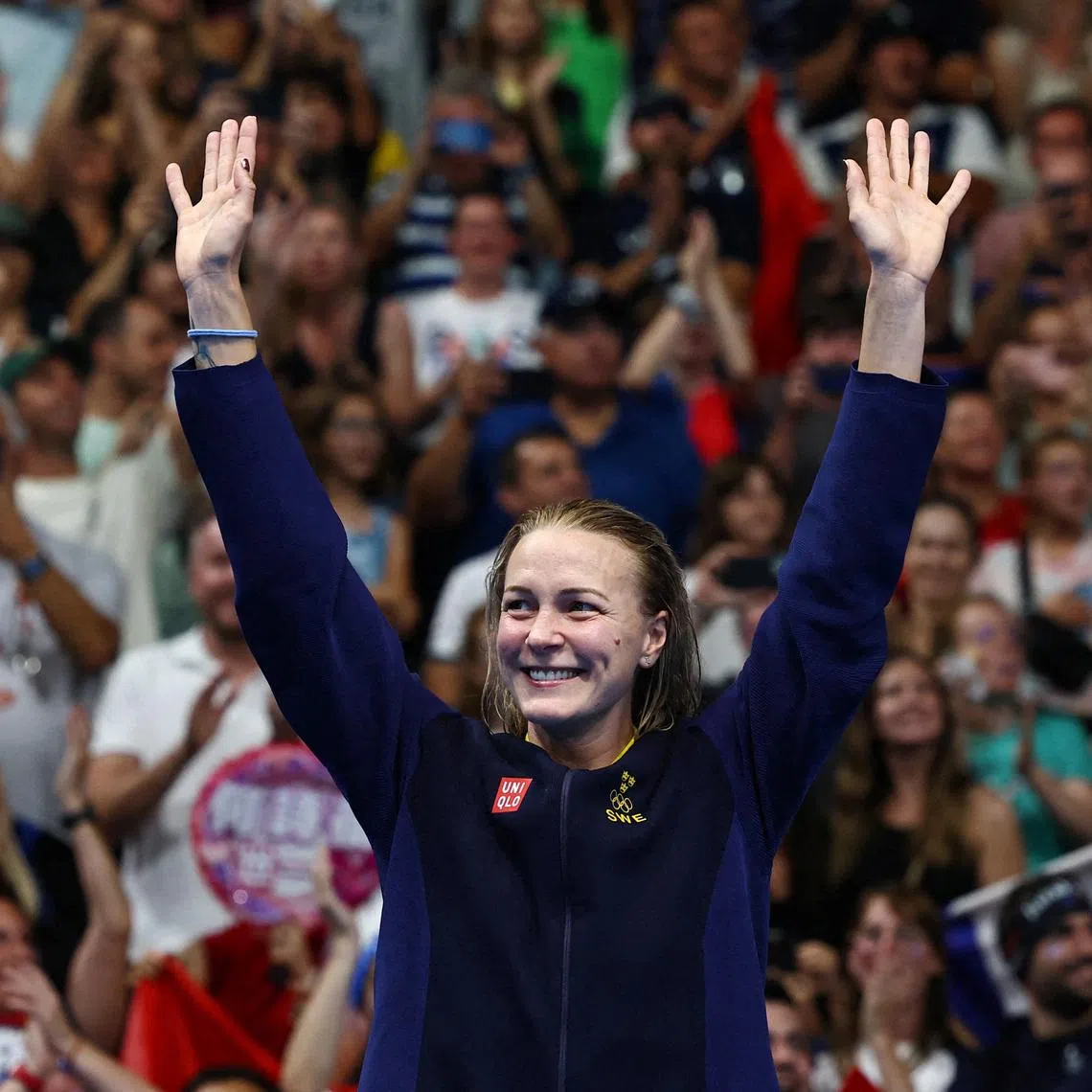Paris 2024 Olympics - Swimming - Women's 100m Freestyle Victory Ceremony - Paris La Defense Arena, Nanterre, France - July 31, 2024. Gold medallist Sarah Sjostrom of Sweden celebrates on the podium after winning. REUTERS/Evgenia Novozhenina