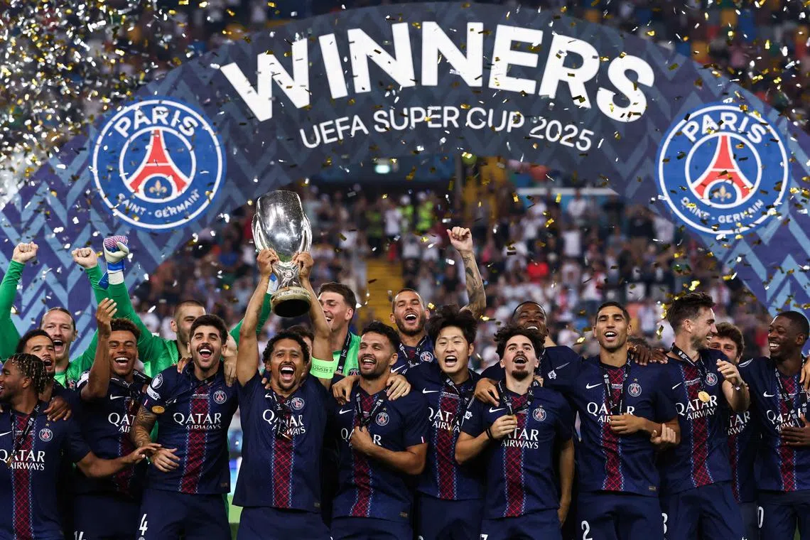 Paris Saint-Germain's Marquinhos lifting the trophy as PSG celebrate winning the 2025 Uefa Super Cup final against Tottenham Hotspur, on Aug 13.