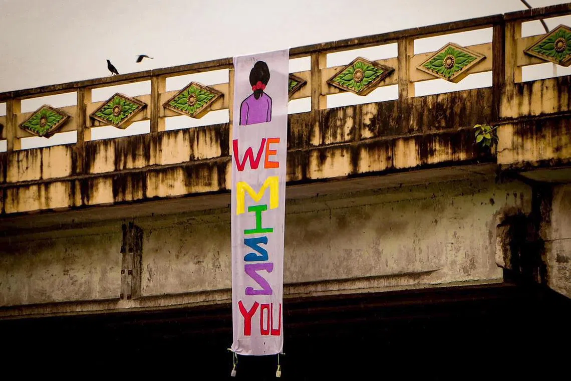 epa10699673 A handout photo made available by Yangon Revolution Force (YRF) shows a banner hanging from a bridge reading 'We Miss You' on the occasion of the 78th birthday of Aung San Suu Kyi, in Yangon, Myanmar, 19 June 2023. Anti-coup groups in Myanmar have called for the public to use flowers to mark Aung San Suu Kyi's 78th birthday on 19 June. The country's former leader has been under house arrest since the military ousted her government in February 2021.  EPA-EFE/YANGON REVOLUTION FORCE HANDOUT  HANDOUT EDITORIAL USE ONLY/NO SALES