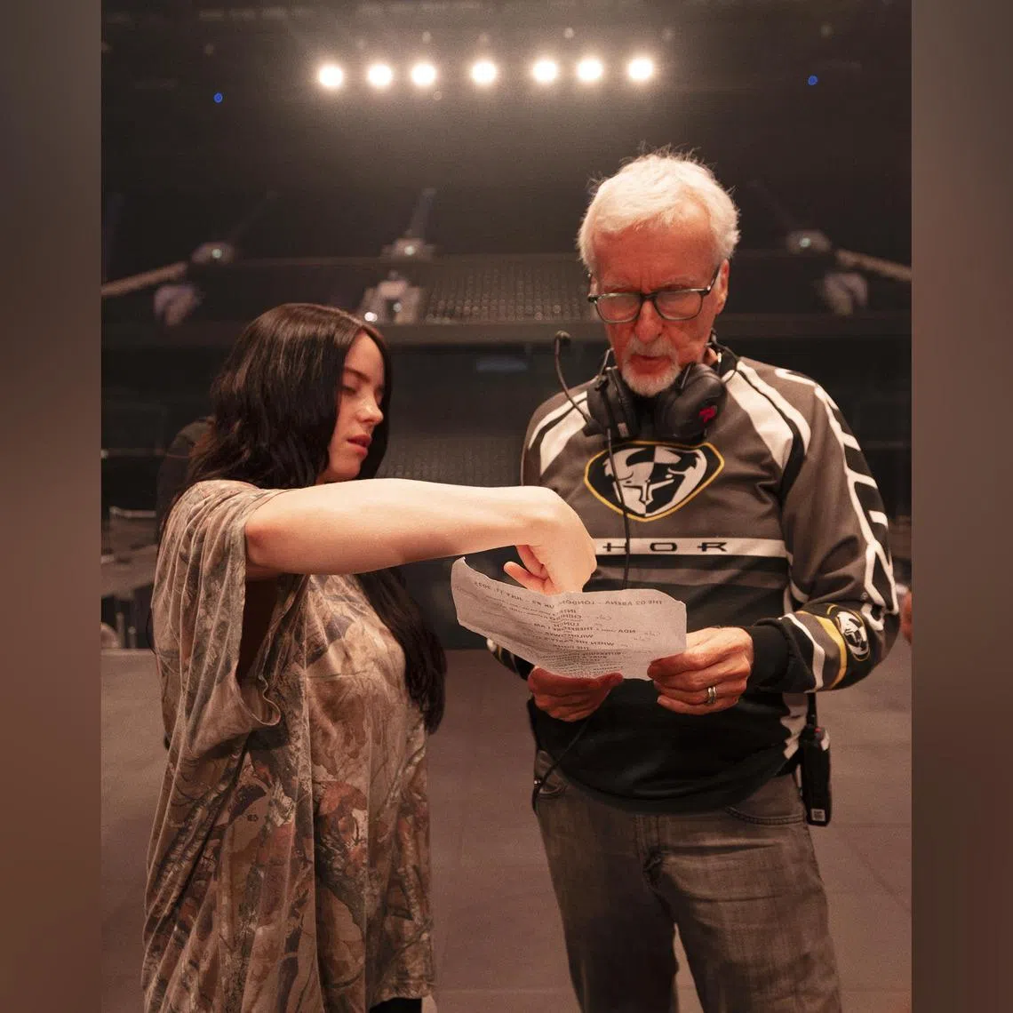 Billie Eilish (left) and James Cameron in a scene from Billie Eilish – Hit Me Hard And Soft: The Tour (Live In 3D).