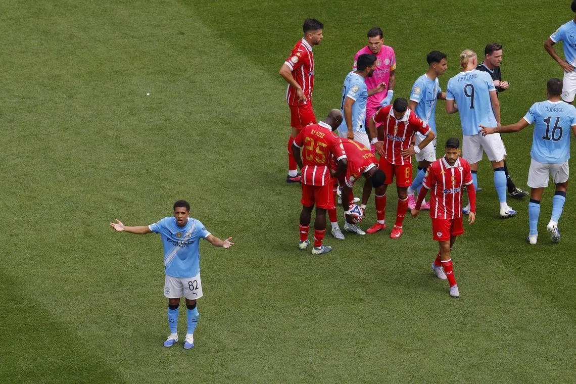 Soccer Football - FIFA Club World Cup - Group G - Manchester City v Wydad Casablanca - Lincoln Financial Field, Philadelphia, Pennsylvania, U.S. - June 18, 2025 Manchester City's Rico Lewis reacts after being shown a red card by referee Ramon Abatti Abel REUTERS/Brian Snyder