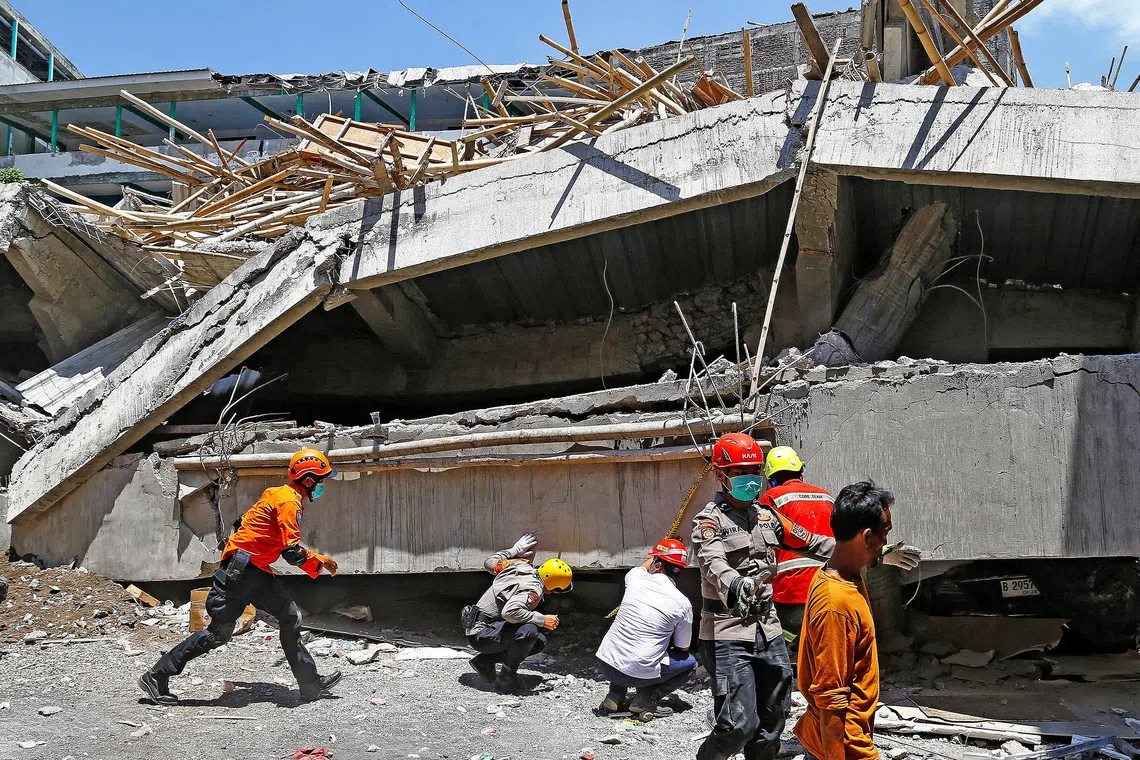 A search for victims after a hall collapsed at the Al-Khoziny Islamic boarding school in Sidoarjo, in Indonesia's East Java province, on Oct 1.