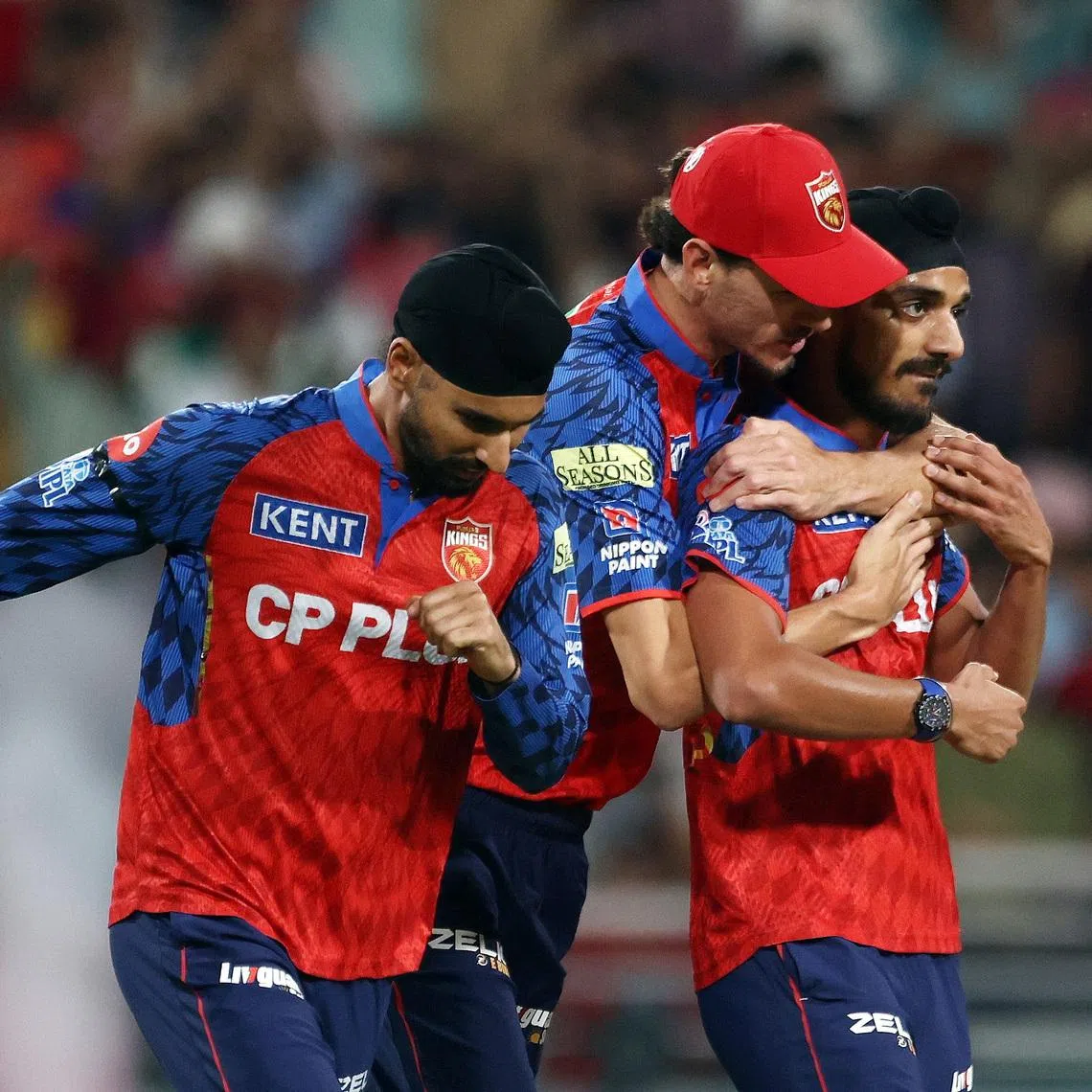 Cricket - Indian Premier League - IPL - Punjab Kings v Rajasthan Royals - Maharaja Yadavindra Singh International Cricket Stadium, New Chandigarh, India - April 28, 2026 Punjab Kings' Arshdeep Singh celebrates with teammates after taking the wicket of Rajasthan Royals' Vaibhav Suryavanshi REUTERS/Mihir Singh