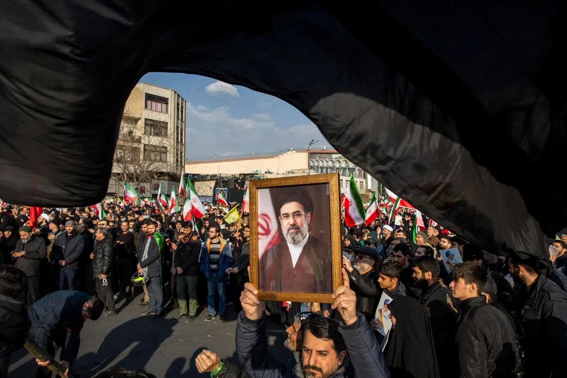 Iranians gathered last month in Tehran with flags and posters to show their support for Mojtaba Khamenei, the new supreme leader.