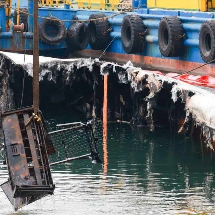 The Ferretti superyacht EagleWings III had been left mostly submerged after it caught fire on the morning of June 7.