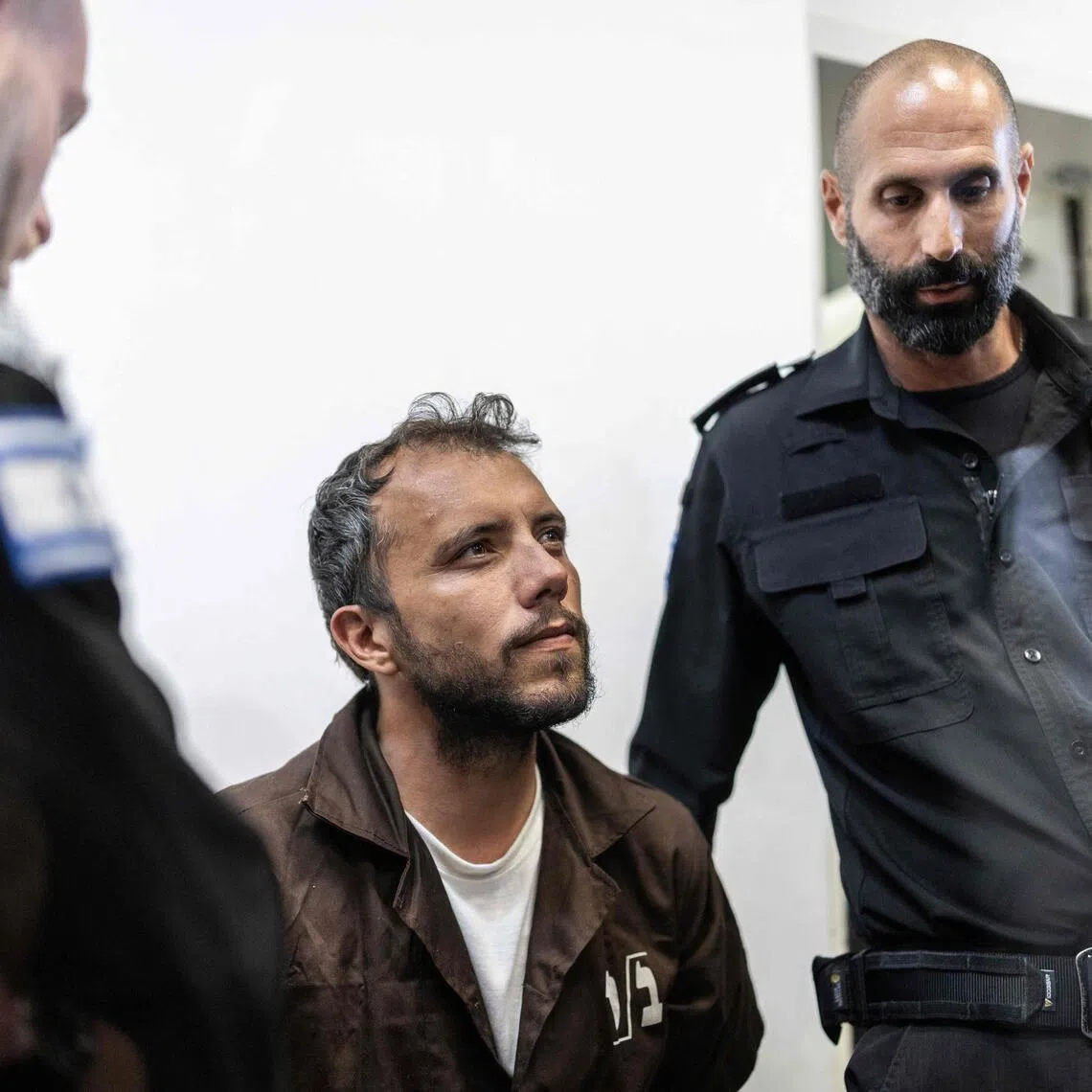 Brazilian activist Thiago Avila being escorted into court in the Israeli coastal city of Ashkelon on May 5.