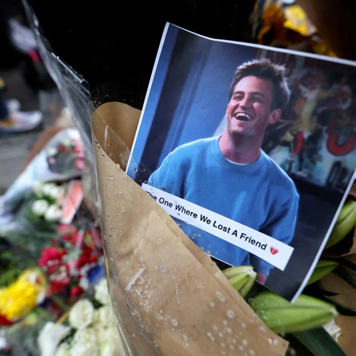 FILE PHOTO: A makeshift memorial for actor Matthew Perry is pictured on Bedford Street in Manhattan in New York City, U.S., October 30, 2023. REUTERS/Mike Segar/File Photo
