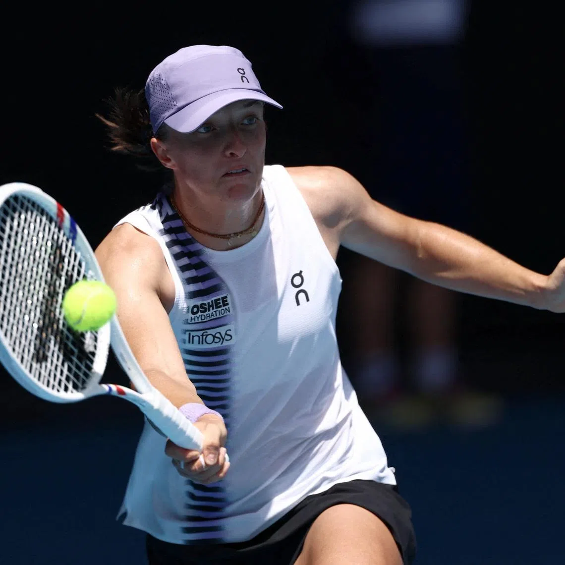 Tennis - Australian Open - Melbourne Park, Melbourne, Australia - January 28, 2026 Poland's Iga Swiatek in action during her quarter final match against Kazakhstan's Elena Rybakina REUTERS/Tingshu Wang
