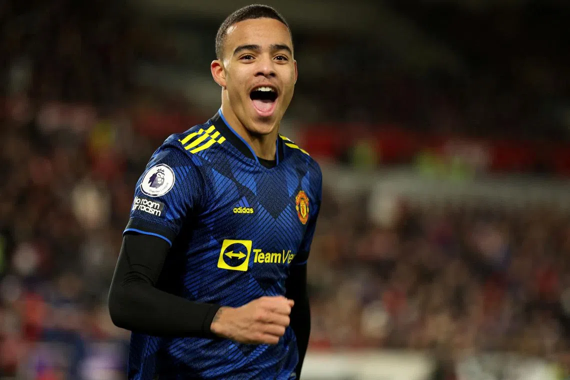 FILE PHOTO: Soccer Football - Premier League - Brentford v Manchester United - Brentford Community Stadium, London, Britain - January 19, 2022 Manchester United's Mason Greenwood celebrates scoring their second goal REUTERS/Ian Walton/File Photo