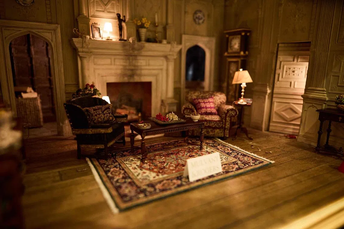 A picture shows miniatures at the London Dollhouse Showcase in London, on May 16, 2025. Every year since 1985, Kensington Town Hall becomes a centre for all dolls house & miniatures enthusiasts & collectors. The annual festival has been gathering some of the world's finest miniature craftspeople since 1985, celebrating a hobby that has seen rising interest in recent years especially with a mushrooming of online activity. It showcases tiny versions of almost any item needed to furnish a house from chandeliers and paintings to mahogany dining tables and ornaments and kitchen items. (Photo by BENJAMIN CREMEL / AFP) / TO GO WITH AFP STORY BY Helen ROWE