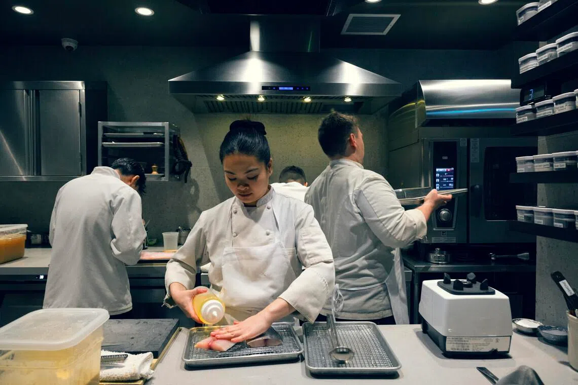Noksu and Ng Jing Wen (centre) were featured in Apple TV’s 2025 documentary series, Knife Edge: Chasing Michelin Stars.