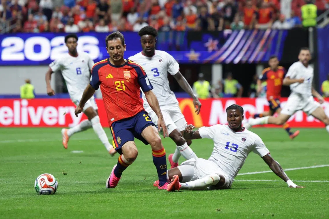 Soccer Football - FIFA World Cup 2026 - Group H - Spain v Cape Verde - Atlanta Stadium, Atlanta, Georgia, U.S. - June 15, 2026 Spain's Mikel Oyarzabal in action with Cape Verde's Sidny Lopes Cabral and Cape Verde's Diney Borges REUTERS/Claudia Greco