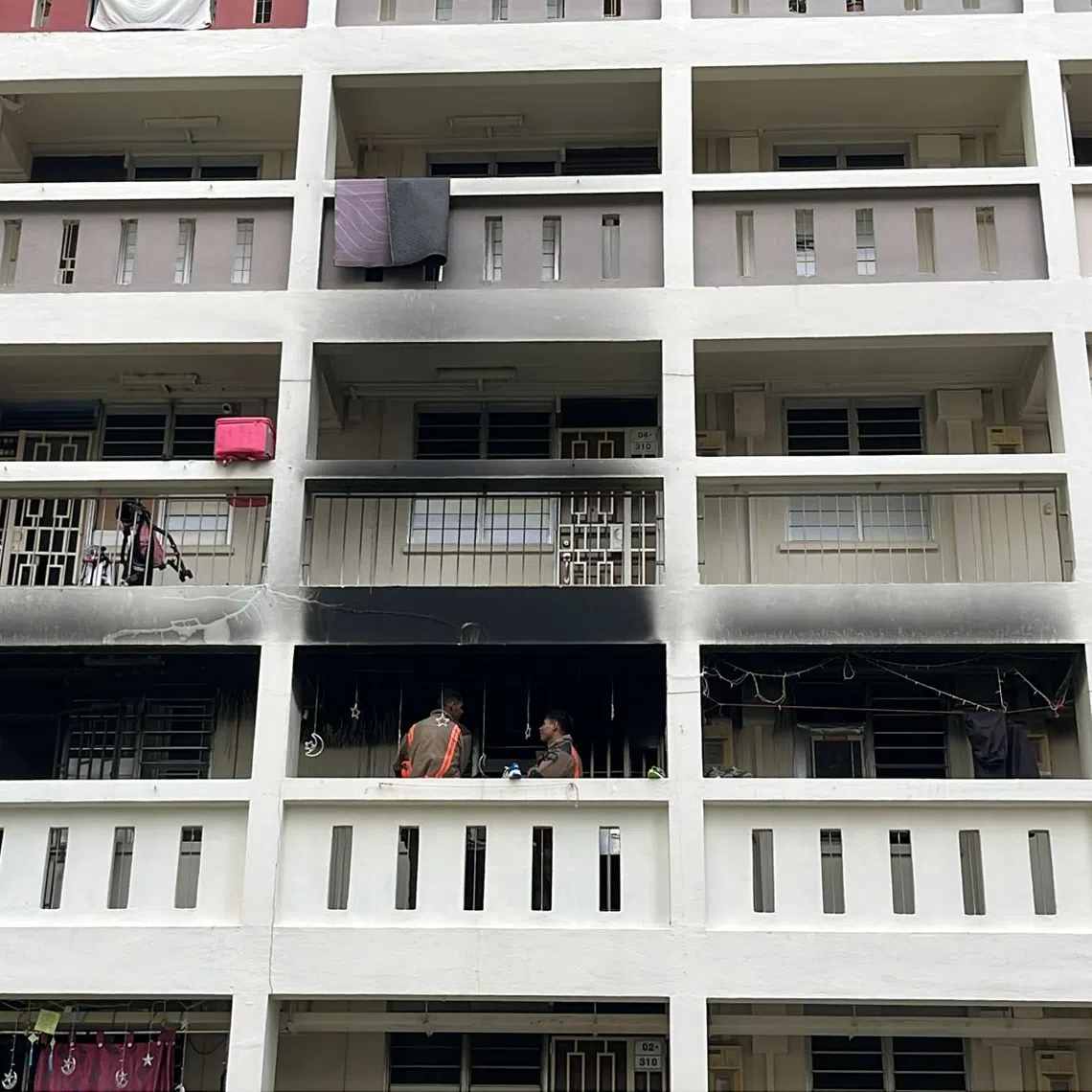 The fire, which appeared to have been on the third floor, was extinguished by the time The Straits Times arrived at the scene at about 10.50am.