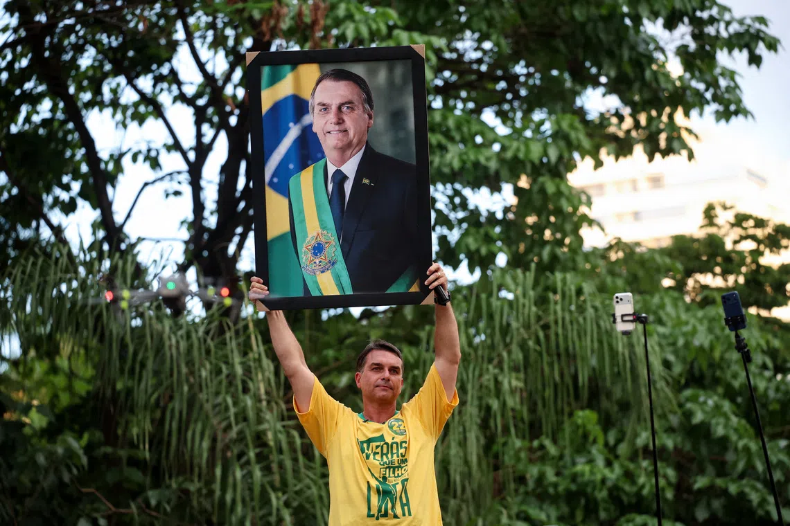 In run for Brazil's presidency, Flavio Bolsonaro tests staying power of his father's legacy