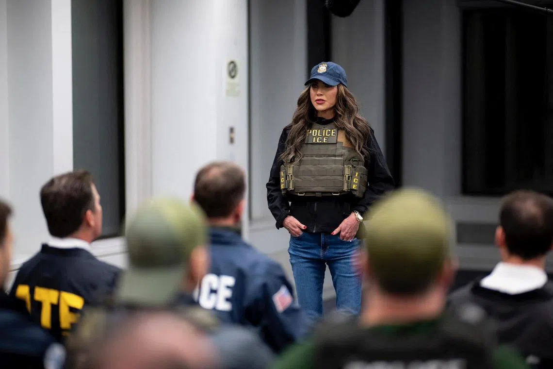 US Department of Homeland Security Secretary Kristi Noem, wearing an ICE vest, attends a briefing with law enforcement agents ahead of immigration raids in New York City on Jan 28.