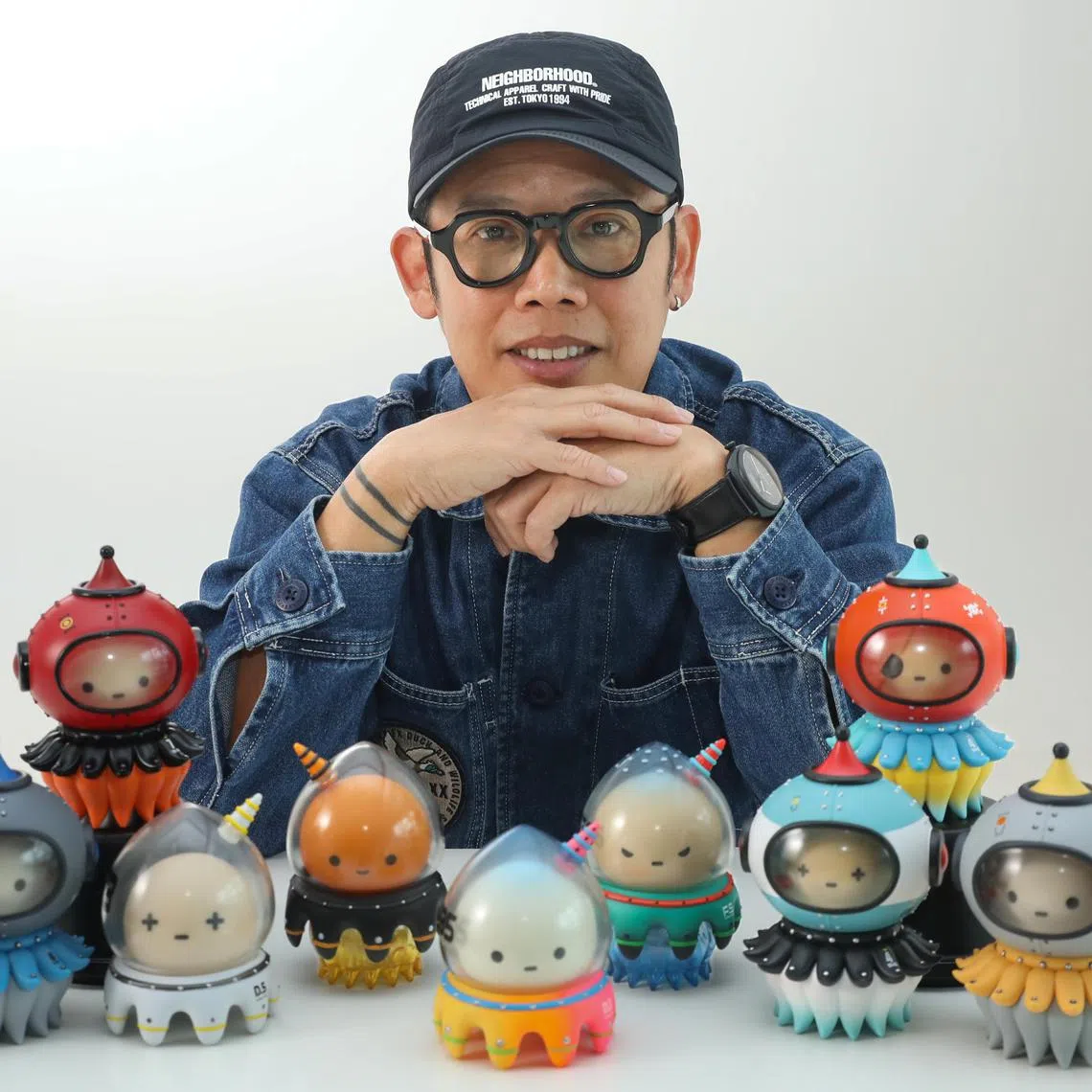 ST20250210_202552800640/llsneaker20/Taryn Ng/ Louisa Lim// Lester Lim, an acclaimed artist, toy designer, and former creative director, poses with JELILO, toys he created with a powerful anti-bullying message on 10 Feb, 2025. ST PHOTO: TARYN NG