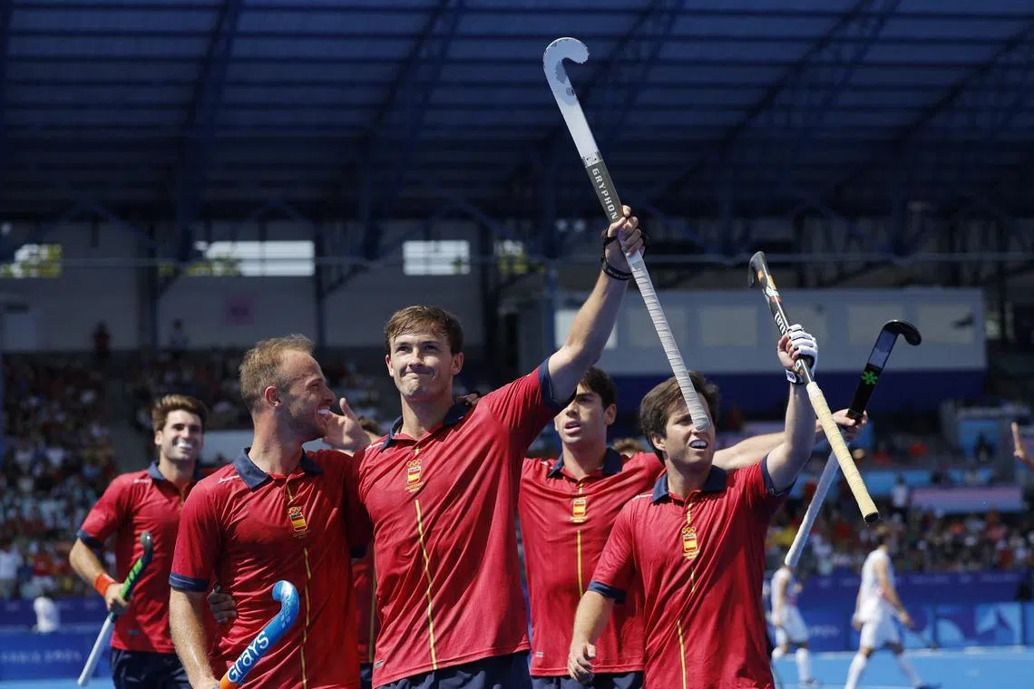 Paris 2024 Olympics - Hockey - Men's Quarter-final - Belgium vs Spain - Yves-du-Manoir Stadium, Colombes, France - August 04, 2024. Jose Maria Basterra of Spain celebrates with teammates after scoring their first goal. REUTERS/Anushree Fadnavis