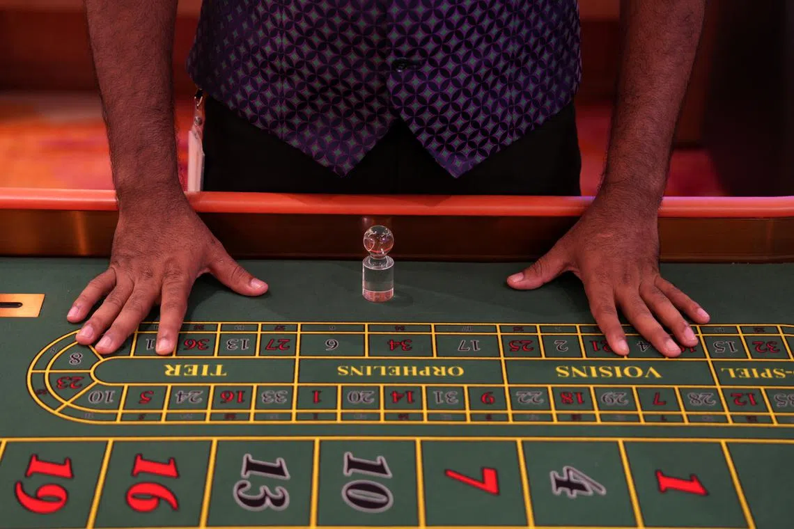 A casino dealer stands at a Roulette table inside a casino at City of Dreams, an integrated resort that includes Sri Lanka's first high end casino, in Colombo, Sri Lanka, August 25, 2025. REUTERS/Thilina Kaluthotage