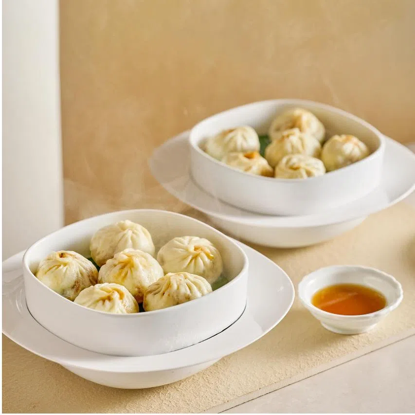 (From left) Steamed Stuffed Buns from Yong Fu Xiao Xian, Chef Water Tang with wild-caught seafood at Shekou Market.