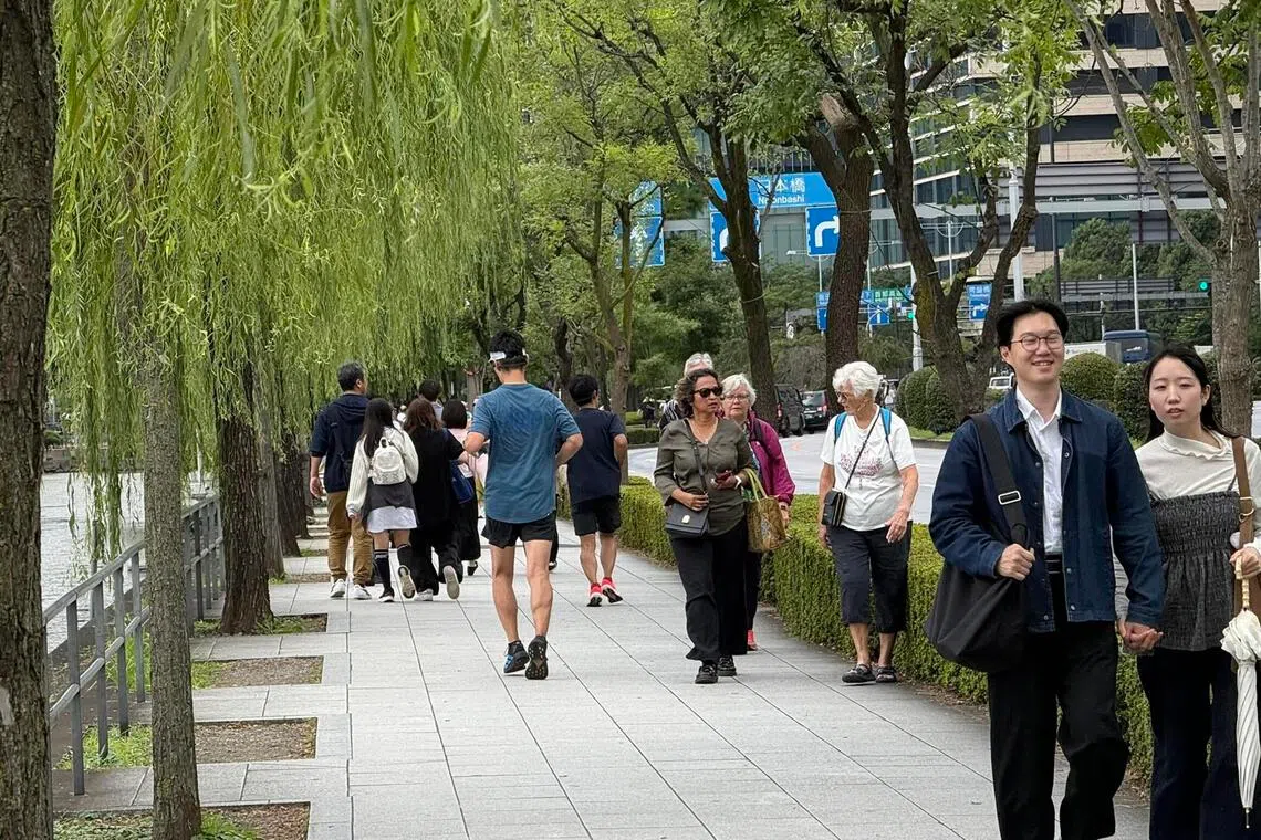Runners and pedestrians on the 5km perimeter encircling Tokyo’s Imperial Palace in this photograph taken on Oct 3.