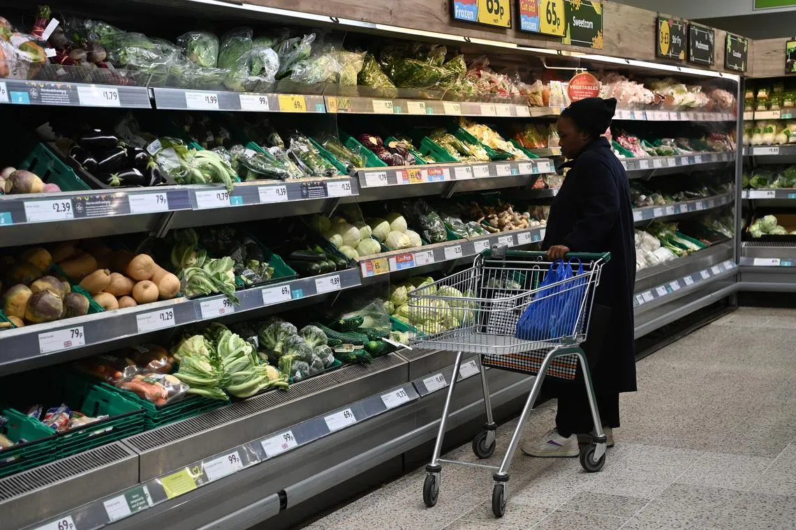 British inflation in Nov fell to 10.7 per cent from Oct's 11.1 per cent, offering some comfort to hard-squeezed households.