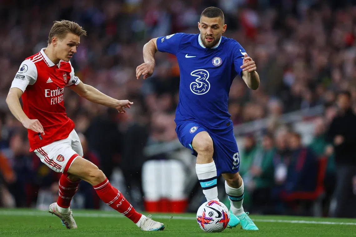 Chelsea's Mateo Kovacic (right) in action with Arsenal's Martin Odegaard.